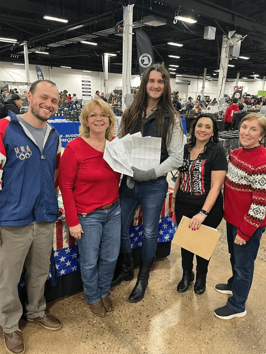 Early Vote Action founder Scott Presler & staff registering voters at a gun show in PA